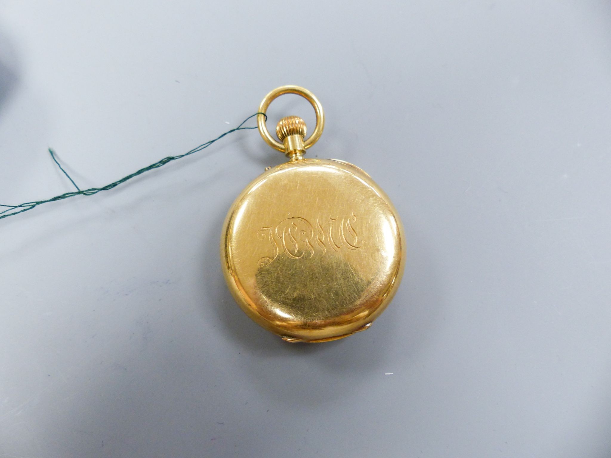 A cased late Victorian 18ct gold half hunter pocket watch, by Carrington & Co, with signed movement, case diameter 37mm, gross weight 62.1 grams, with key.